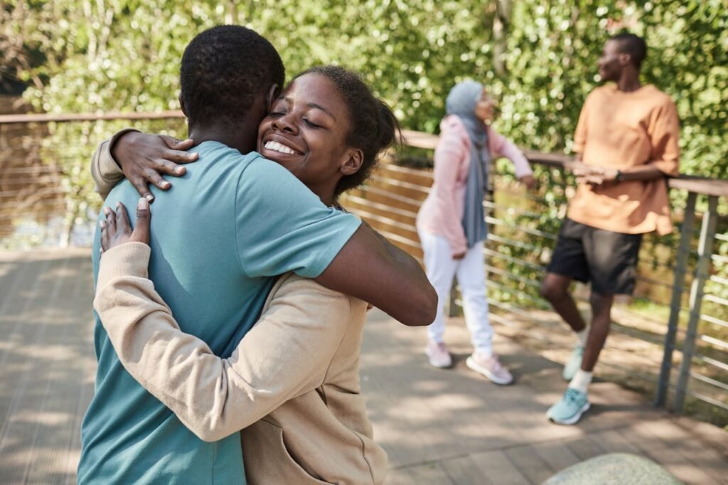 Man and Woman Hugging Each Other